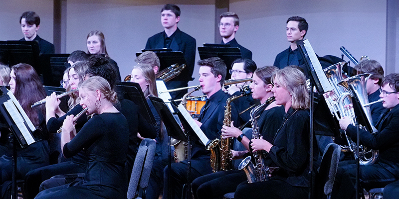 Members of the Symphonic Band performing a concert