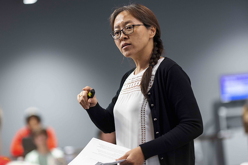 Dr. Jenny Song teaches a marketing class at Northwestern College