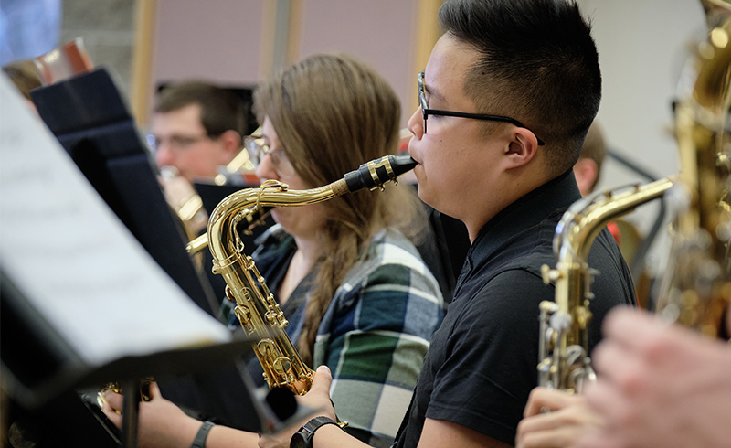 Members of the Symphonic Band in rehearsal