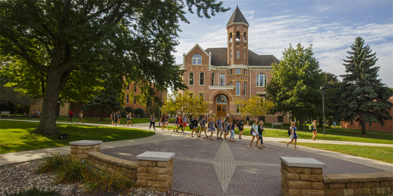 Students walking by Zwemer Hall