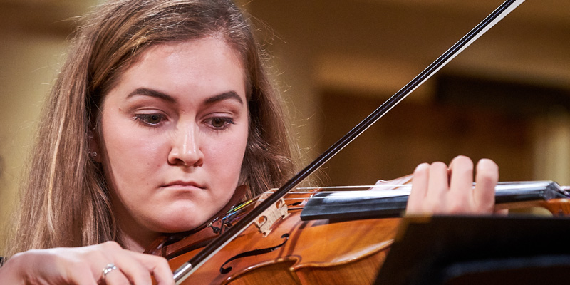 Student playing the violin