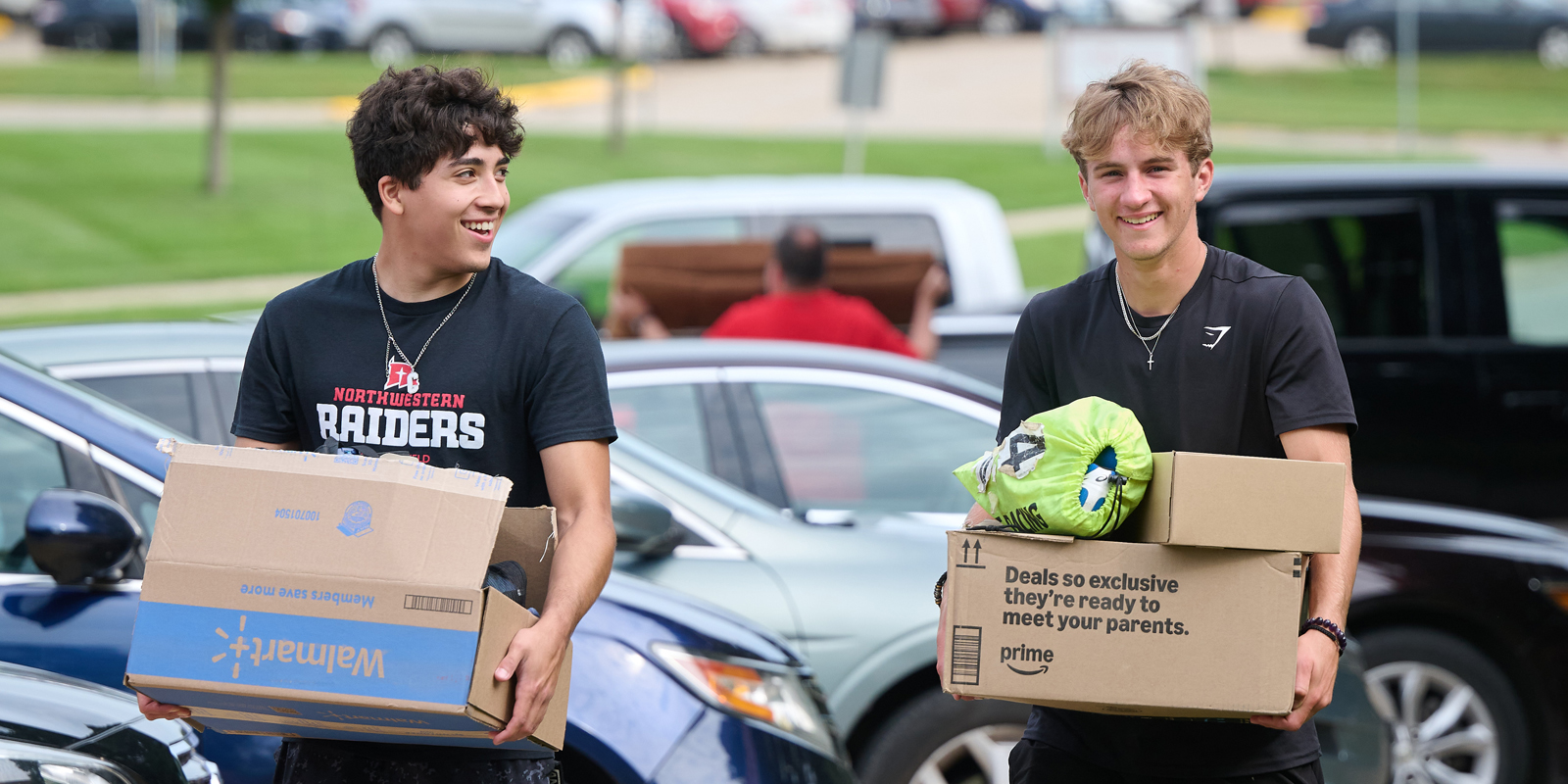 Students moving into their dorms during Orientation Weekend