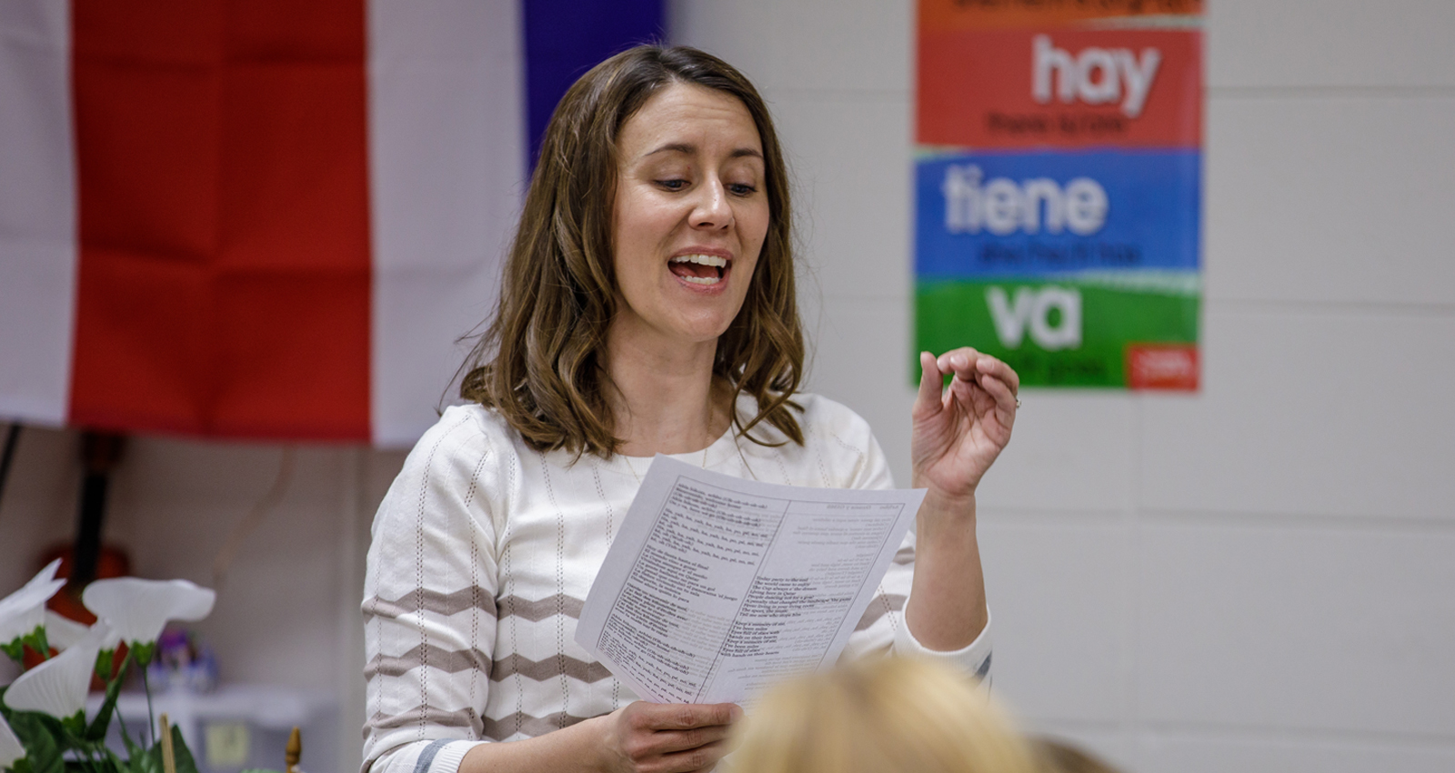 A teacher giving a lecture in class